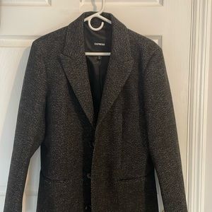 Water resistant men’s top coat. Never worn. Brand new without tags.
